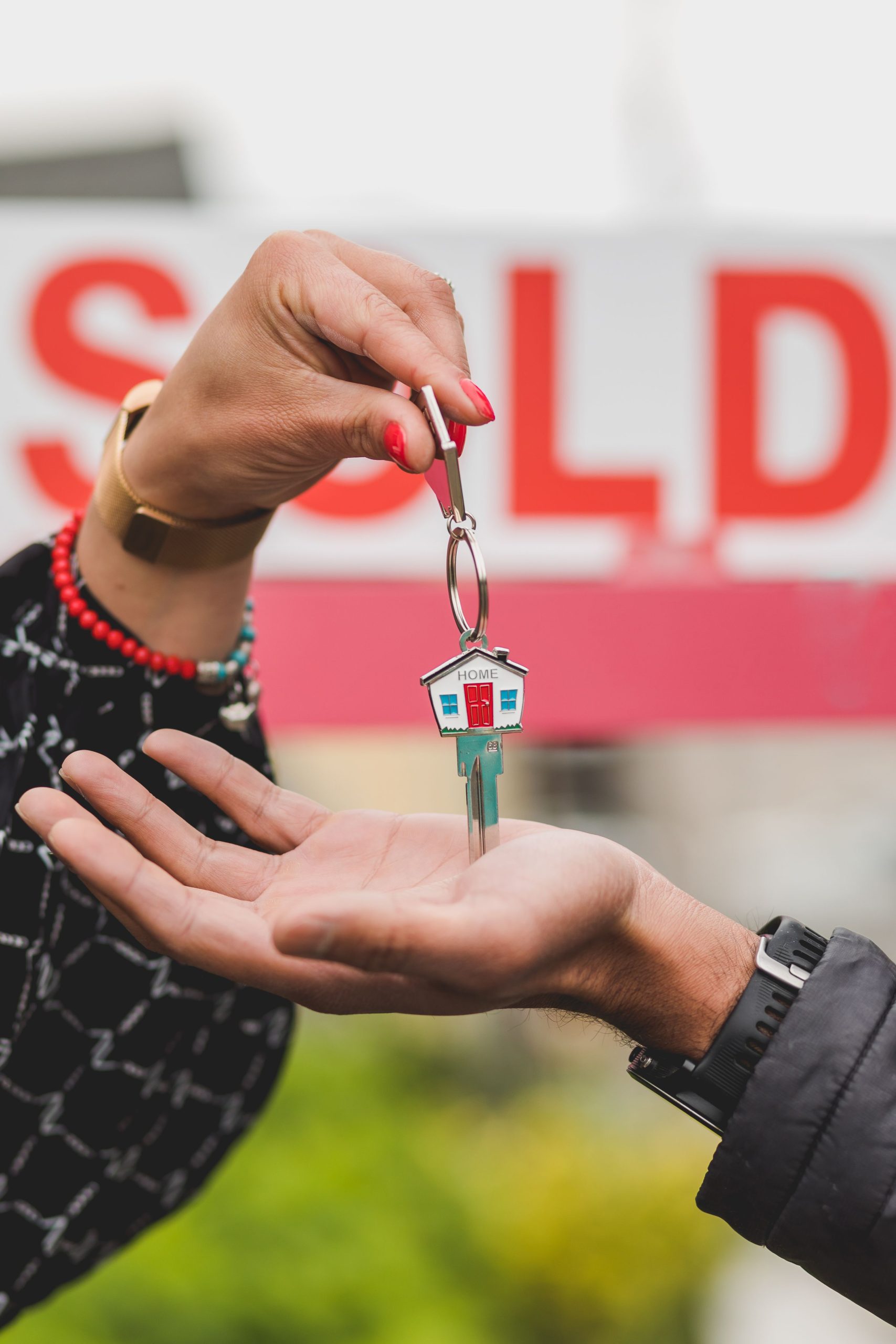 Sold sign outside residential property — bridging loan services Perth WA