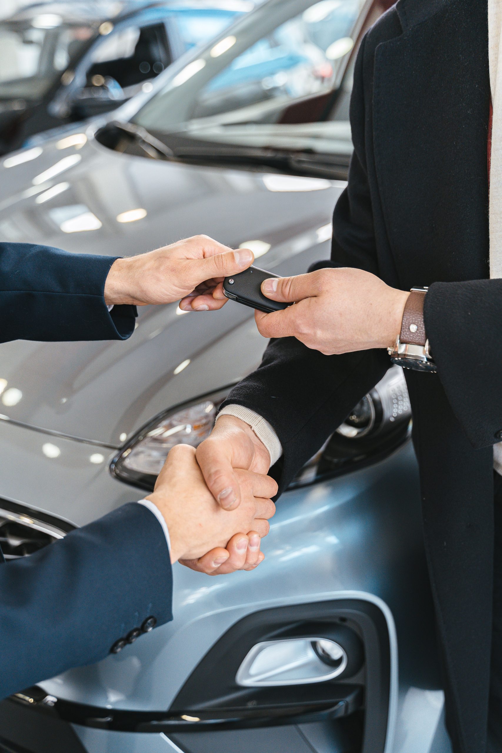 Man smiling beside new car — car and personal loans Perth WA